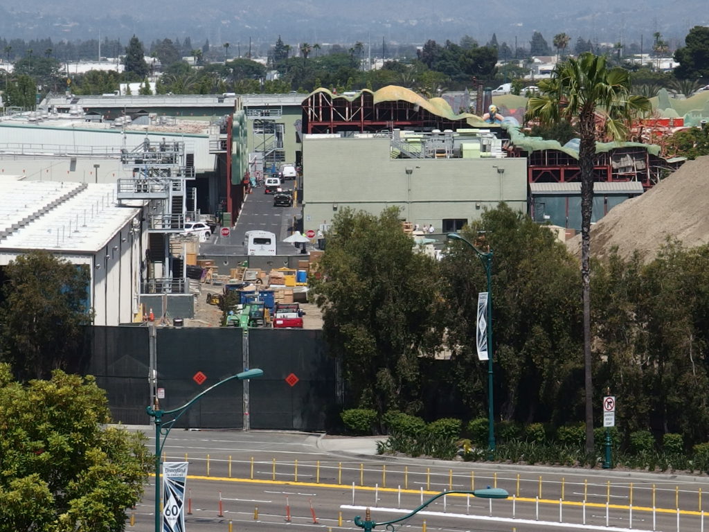 A section of backstage road is being used to stage equipment