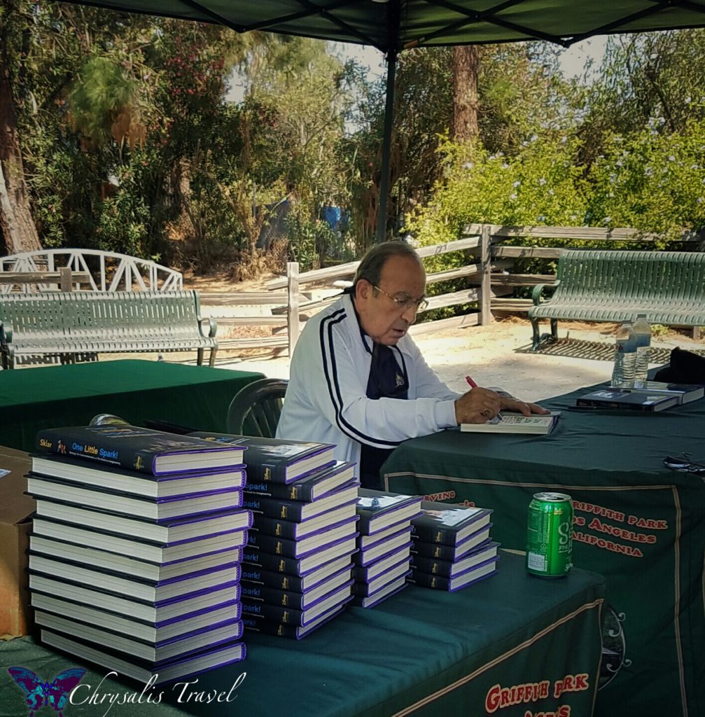 Marty Sklar signing books
