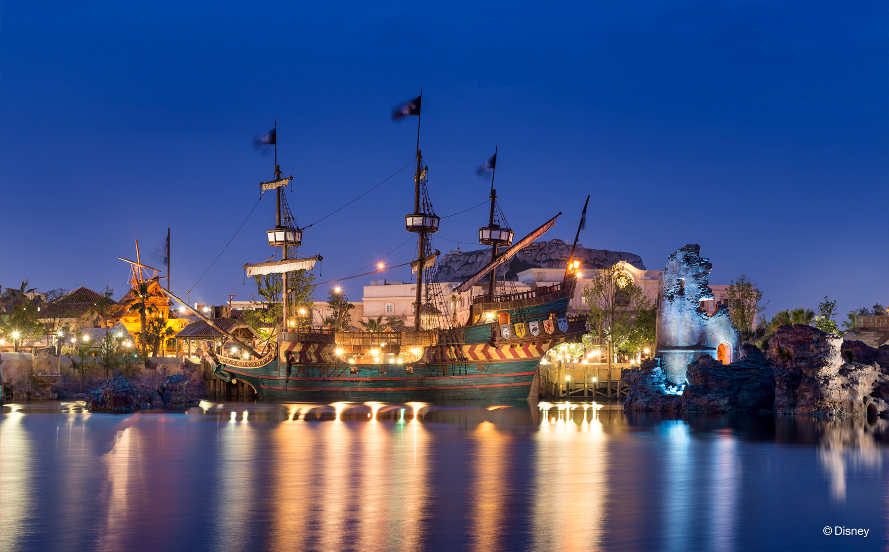 AHOY FROM TREASURE COVE –– Guests can enter a town taken over by pirates in Treasure Cove at Shanghai Disneyland. The adventures of Captain Jack Sparrow, Captain Barbossa, and the rest of the motley crew have inspired attractions and entertainment at Disney theme parks around the world. (Disney)