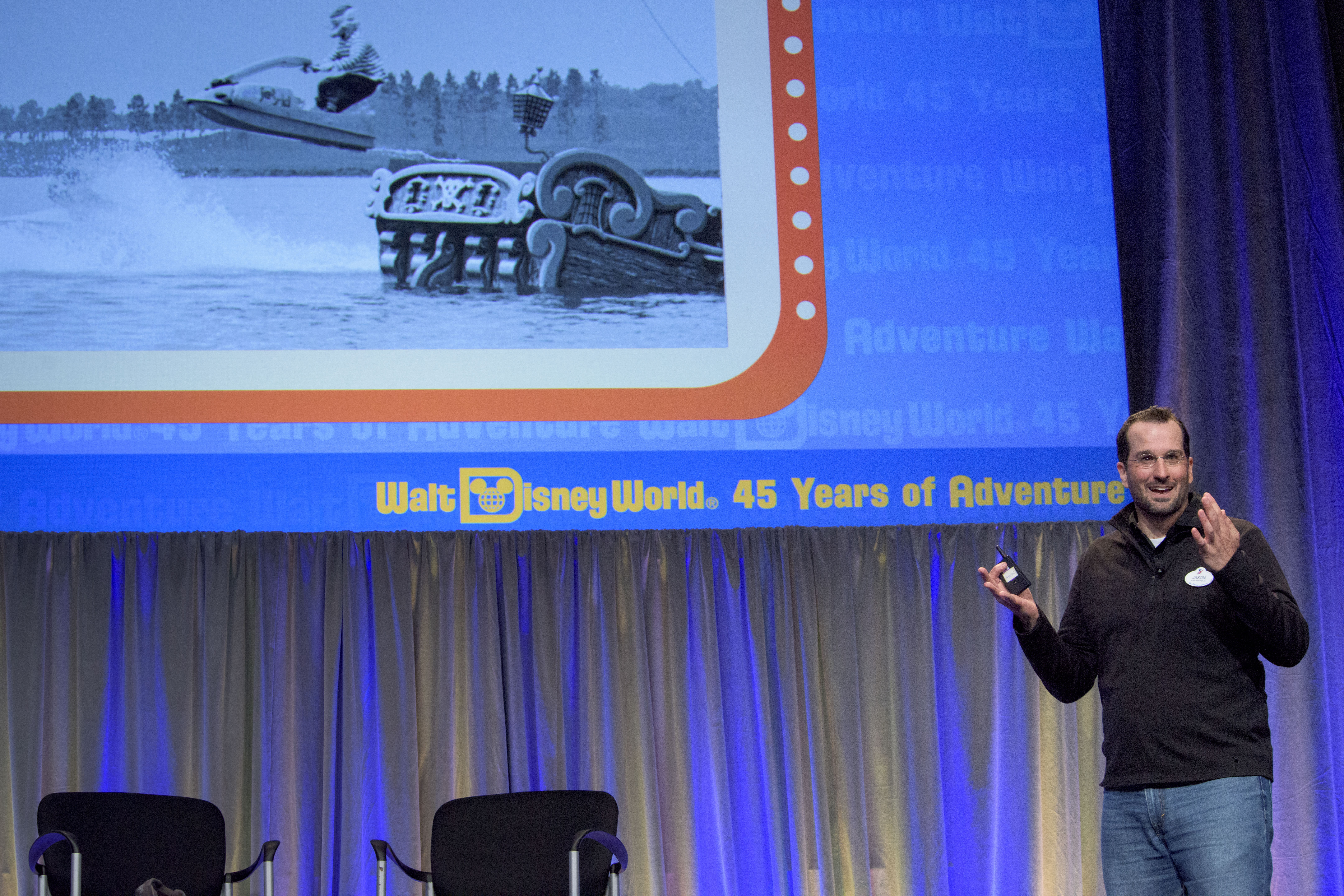 Imagineers Jason Grandt, with Alex Wright, took guests on a nostalgic journey through fondly remembered attractions from Walt Disney World Resort. (Disney)