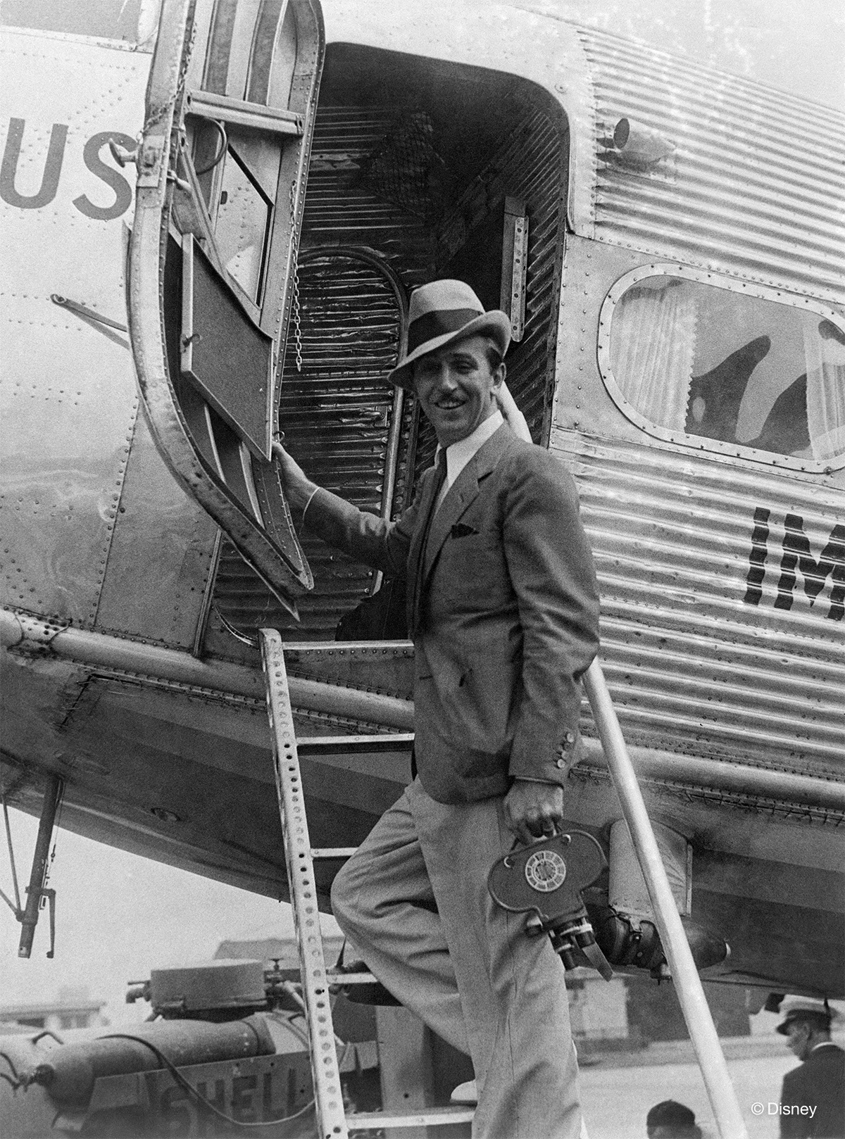 UP IN THE AIR –– A dapper Walt Disney arrives at Le Bourget airport, near Paris, on June 25, 1935. This photo, along with additional archival images, props, and models, is a part of “Walt’s Great Adventures,” an exhibit showcasing Walt Disney’s travels and some of his most memorable projects, curated by the Walt Disney Archives exclusively for D23 Destination D: Amazing Adventures. (Disney)