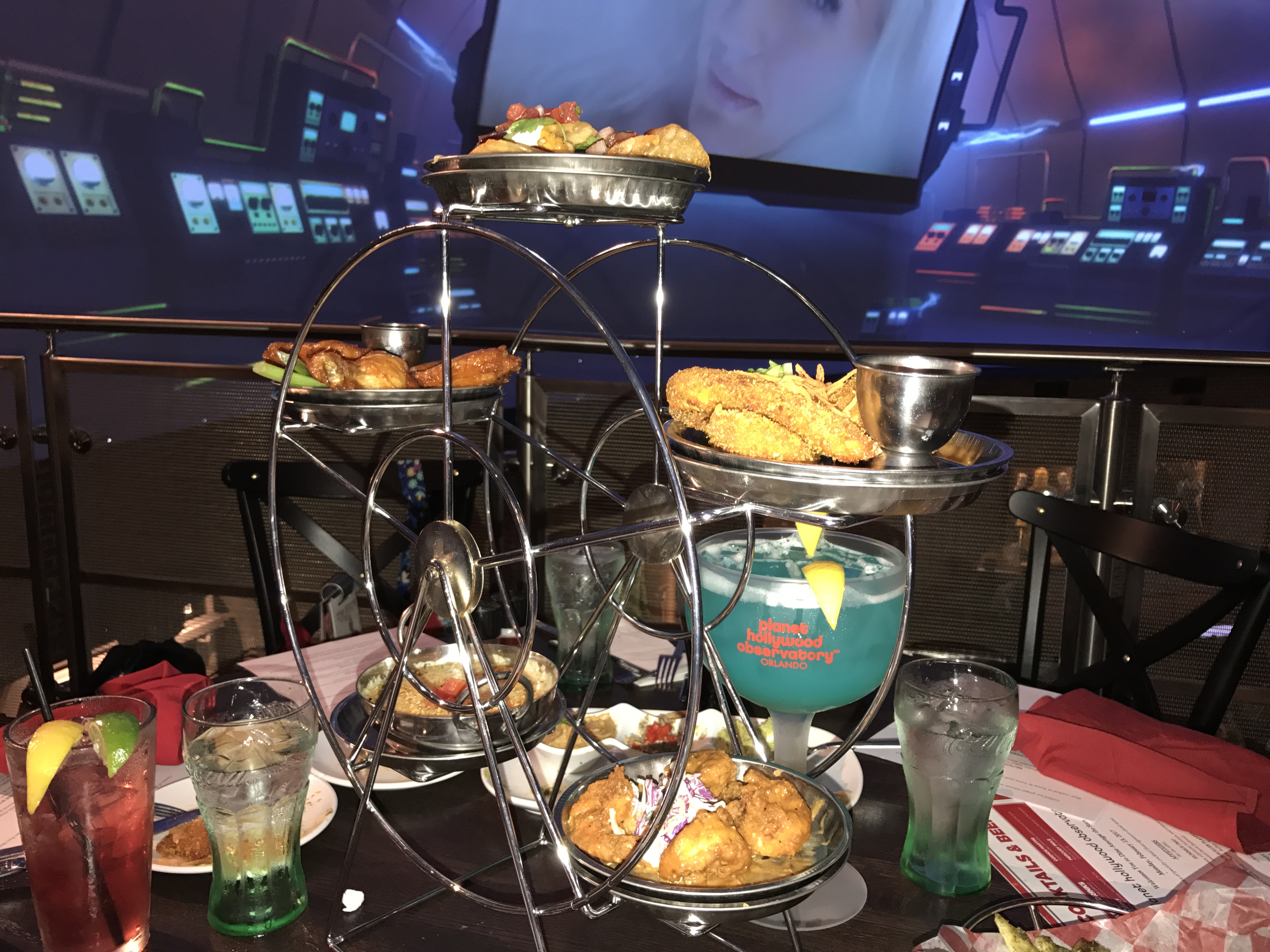 High Roller Platter, a celebration of “best-ofs” with the Chicken Crunch, Texas Tostados, Buffalo Wings, Cheesy Spinach Dip, Peri-Peri Shrimp served in a uniquely designed Ferris-wheel dish.