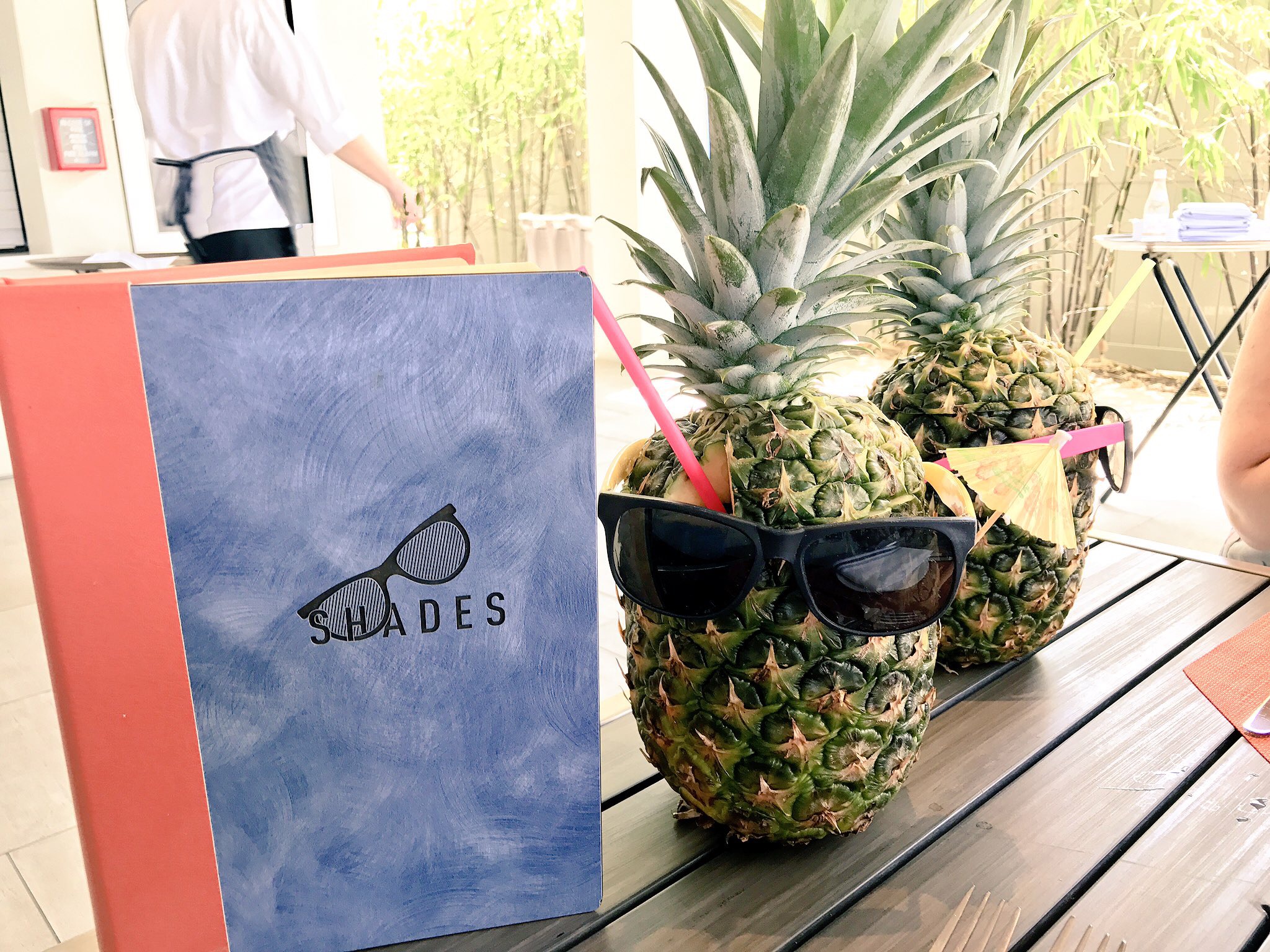 Wayfarer - Bailey's Irish cream, crème de banana, pina colada purée, served in a while pineapple with a Pusser's rum floater on top.