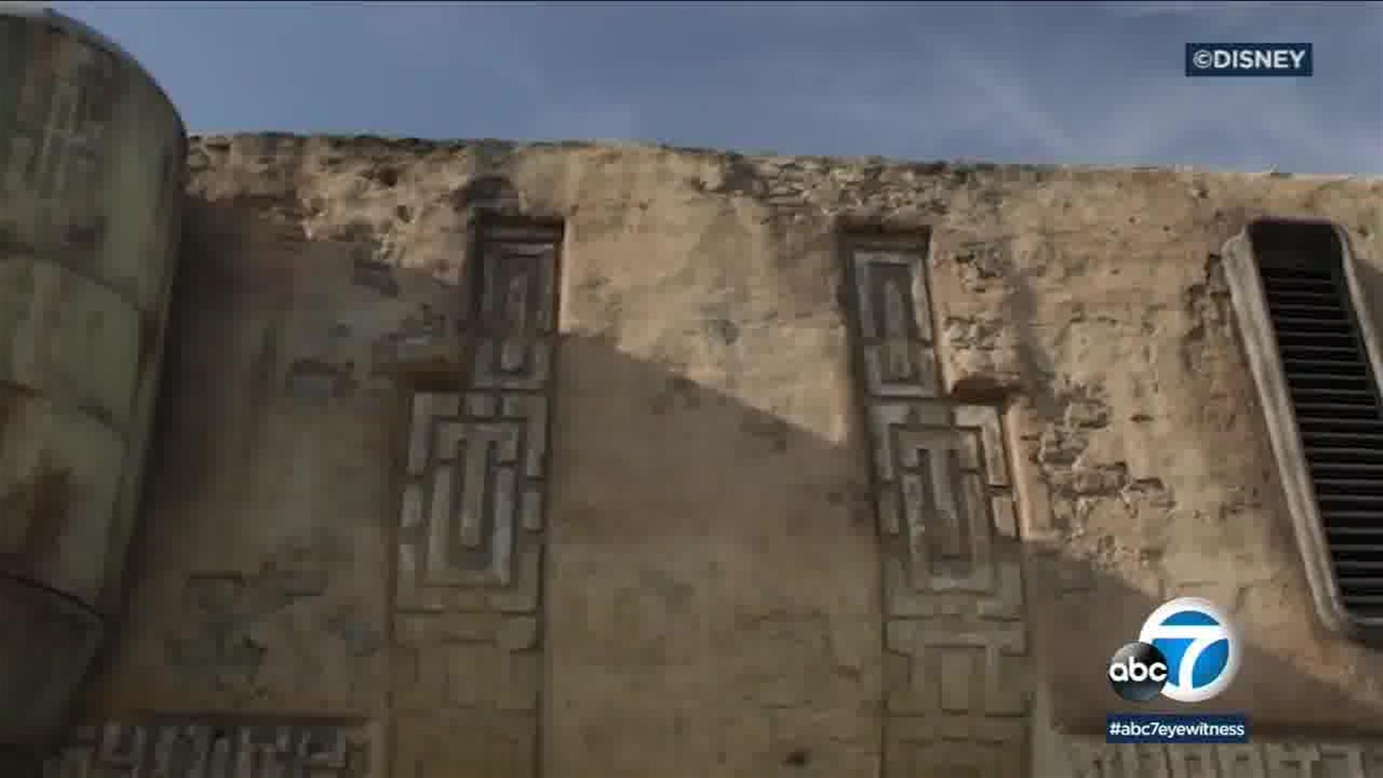 Strange markings line the exterior walls of Black Spire Outpost's buildings. Is this some kind of local language or simply decoration?