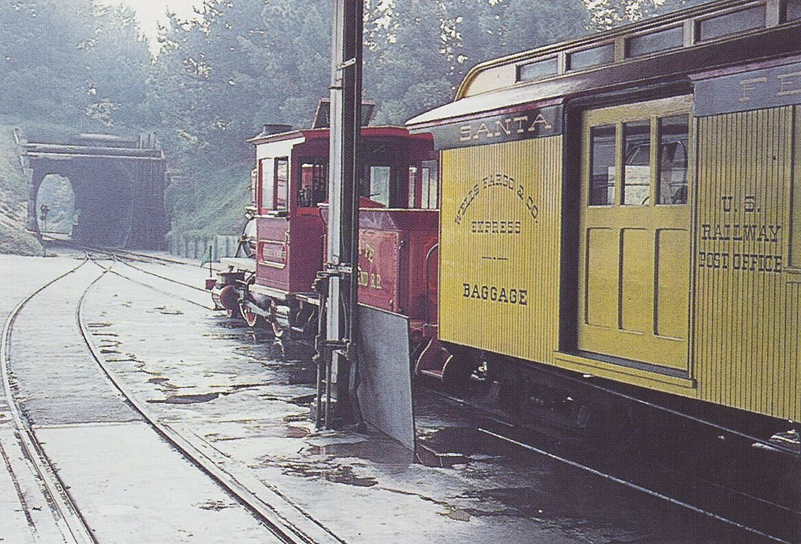 Engine #4, the Ernest S. Marsh, prepares to enter the main line through the tunnel to the east.