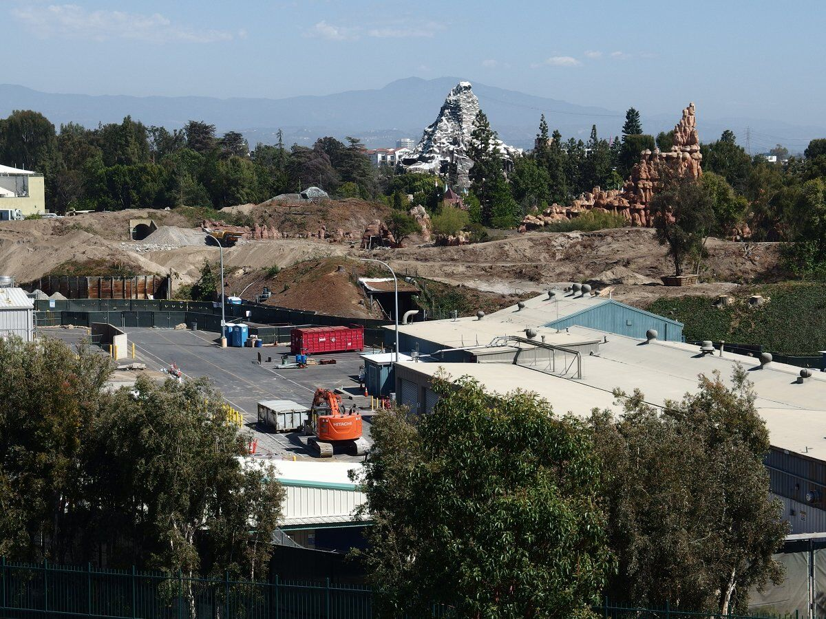 It is easy to spot the original tunnel through the berm in this early view of the process.