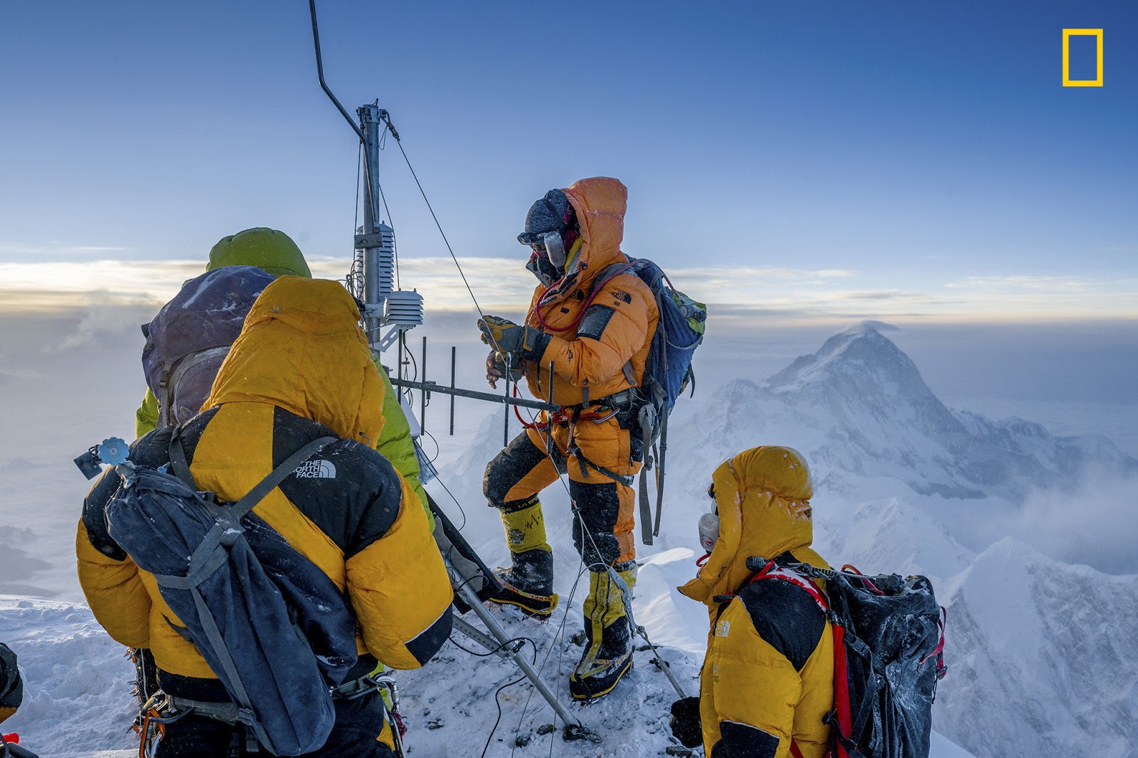 After deciding to abandon their summit attempt, the team puts together their final weather station on Everest's Balcony. During the process, they realized they had left a crucial piece of equipment behind: the mount for the system's wind sensors. Determined to complete the job, the team rigged the handle of a shovel to attach the sensors.PHOTOGRAPH BY MARK FISHER/NATIONAL GEOGRAPHIC