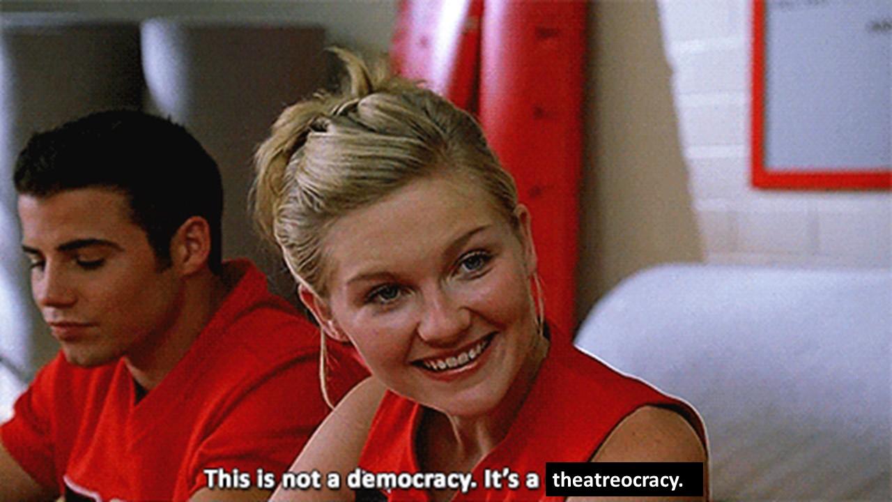 Two people smiling for the camera</p>
<p>Description automatically generated