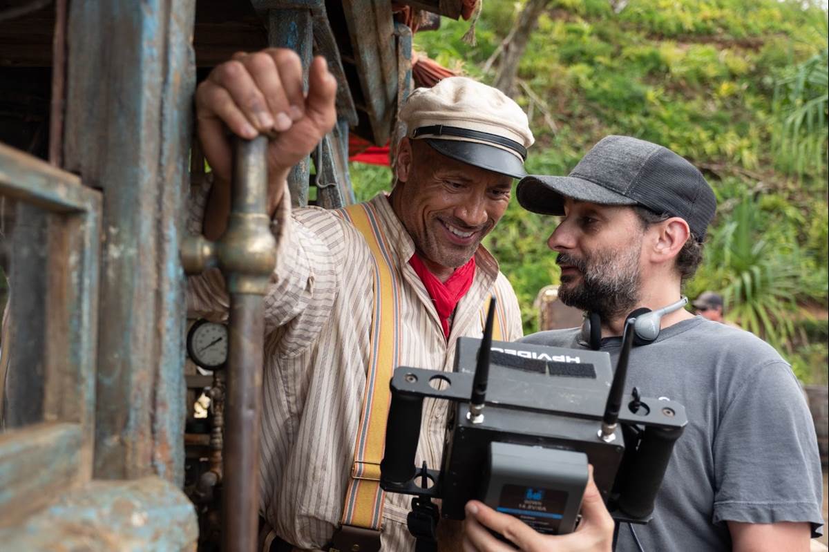 Dwayne Johnson and director Jaume Collet-Serra on the set of Disney’s JUNGLE CRUISE. Photo by Frank Masi. © 2021 Disney Enterprises, Inc. All Rights Reserved.