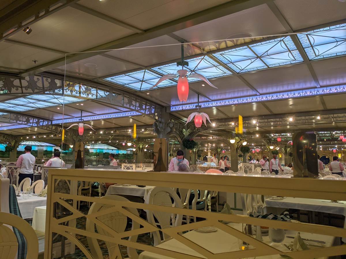 A plexiglass divider has been added here to increase separation. Enchanted Garden was the only dining location with this addition.