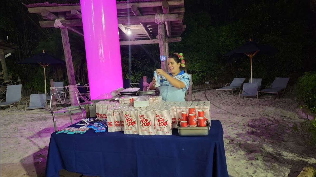 Cast distribute the treats included in the admission price at various locations