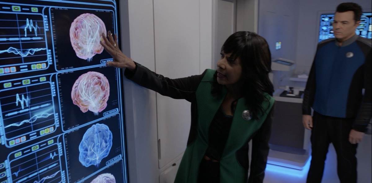 The crew gets a check up and brief explanation from Dr. Finn