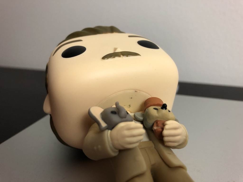 Is the marking under the chin what makes this "Not Mint"?