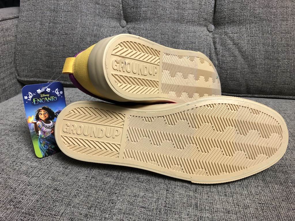 Rubber outsole reads Ground Up on the heel