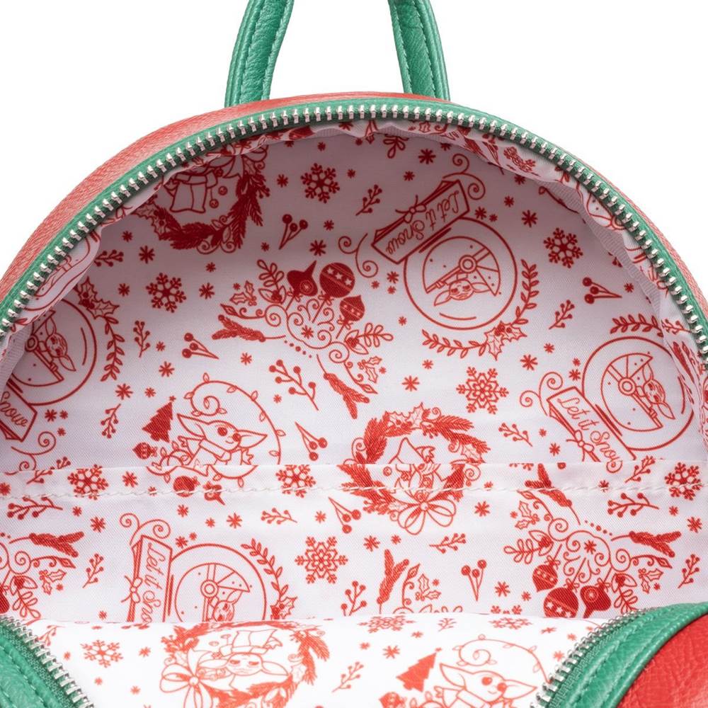 Interior lining has tons of Holiday theming like ornaments, wreaths, and snow globes.