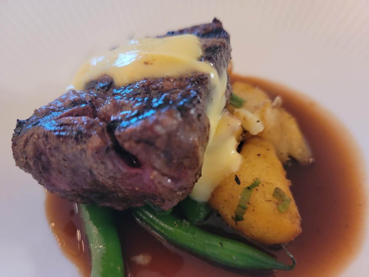 Grilled Medallions of Filet: Bacon fat béarnaise, crispy Brabant potatoes tossed with onions, season's vegetables