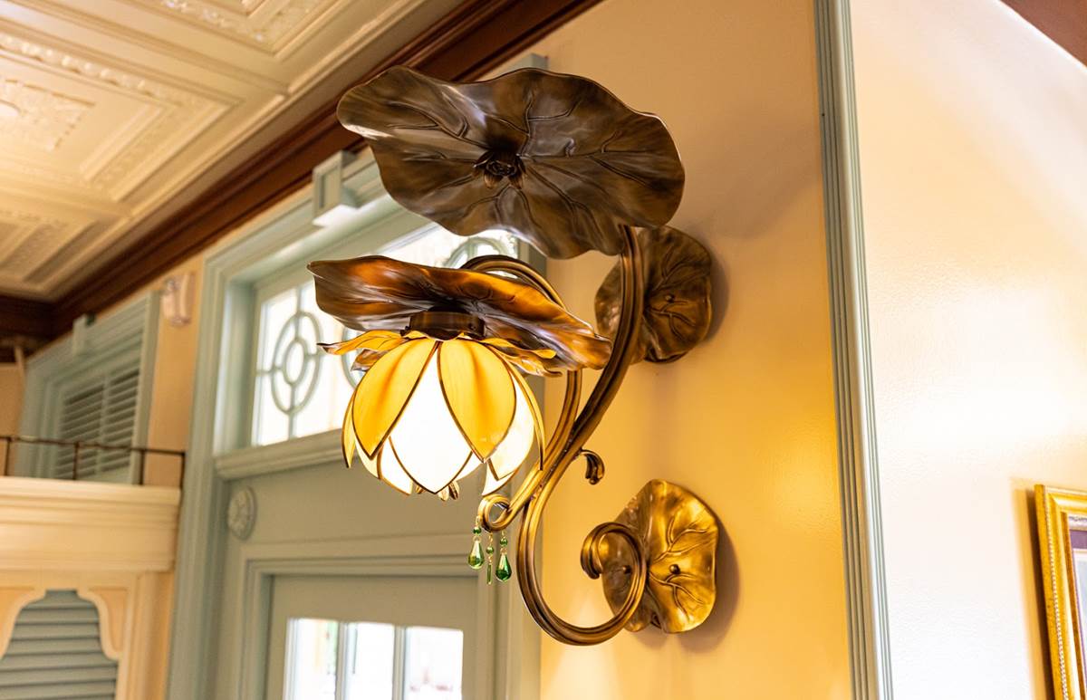 The water lily light fixtures of Tiana’s Palace are modeled directly from the art sketches for the Princess and the Frog