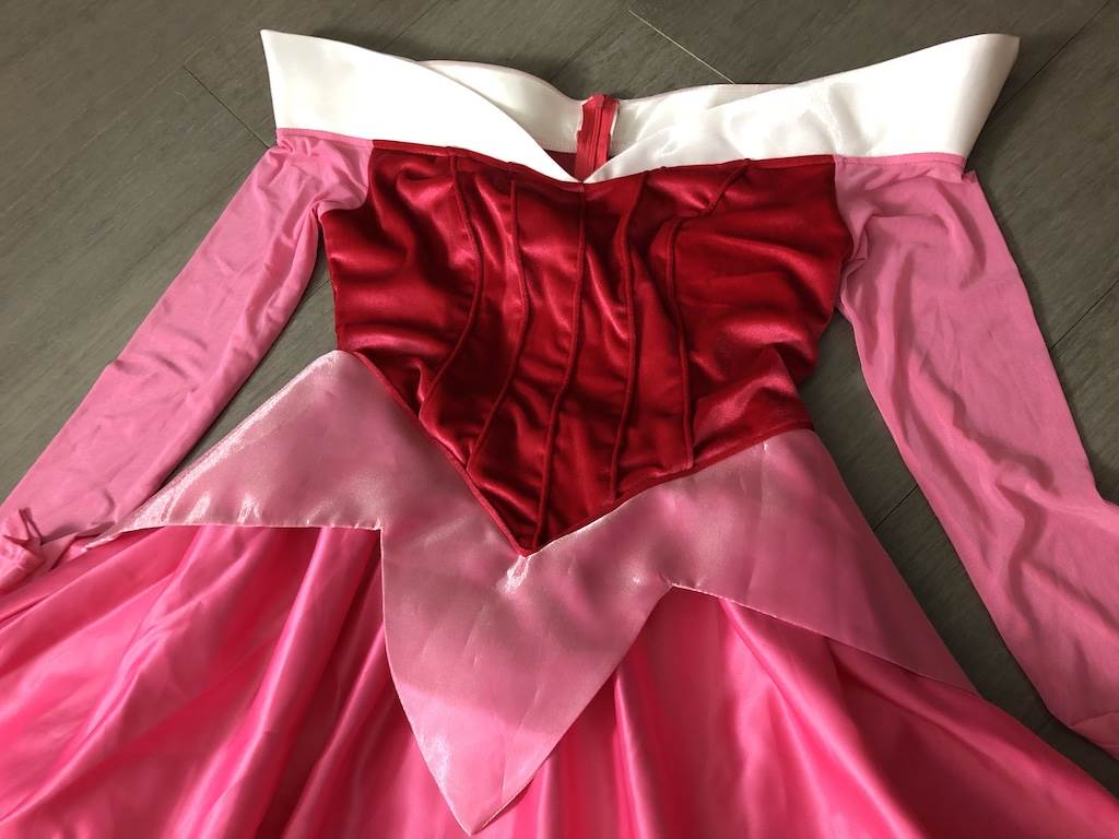 Stretch velvet bodice with piping is soft and comfortable.