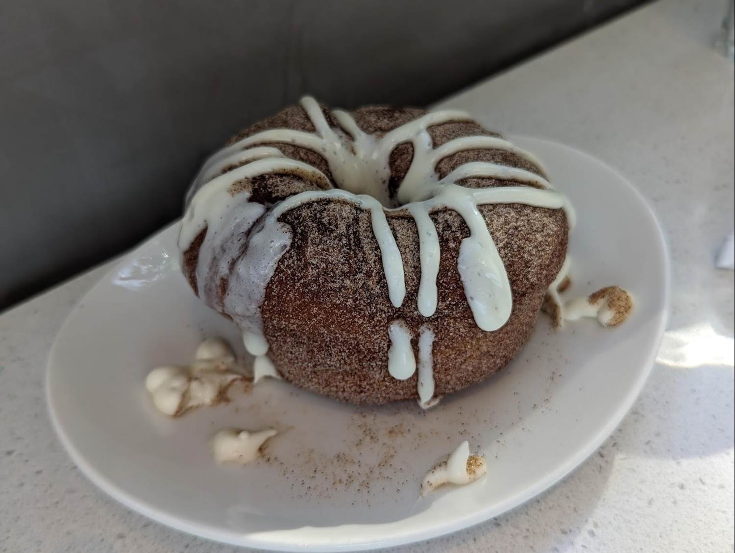 Tasty super tall donuts - January’s specialty flavor, Cinnamon Roll