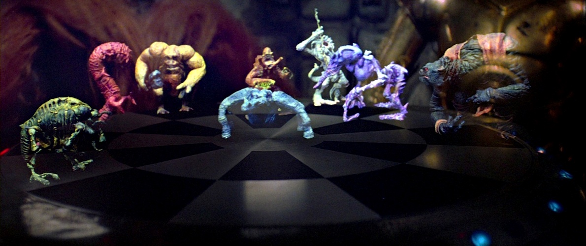 Mantellian Savrip (on the right) as a piece on a Holochess board.