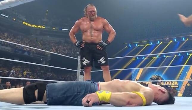 Brock Lesner looks down on John Cena
