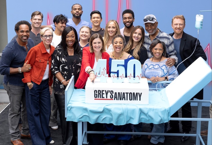 GREY’S ANATOMY – Grey’s Anatomy 450th episode cake-cutting celebration. (Disney/Frank Micelotta)
TOP: JASON GEORGE, CHRIS CARMACK, NIKO TERHO, TREVOR JACKSON, HARRY SHUM JR., KIM RAVER, ANTHONY HILL, CAMILLA LUDDINGTON, JAMES PICKENS JR., KEVIN MCKIDD
BOTTOM: BETSY BEERS (EXECUTIVE PRODUCER), SHONDA RHIMES (EXECUTIVE PRODUCER), JAICY ELLIOT, MEG MARINIS (EXECUTIVE PRODUCER), DEBBIE ALLEN, CHANDRA WILSON
